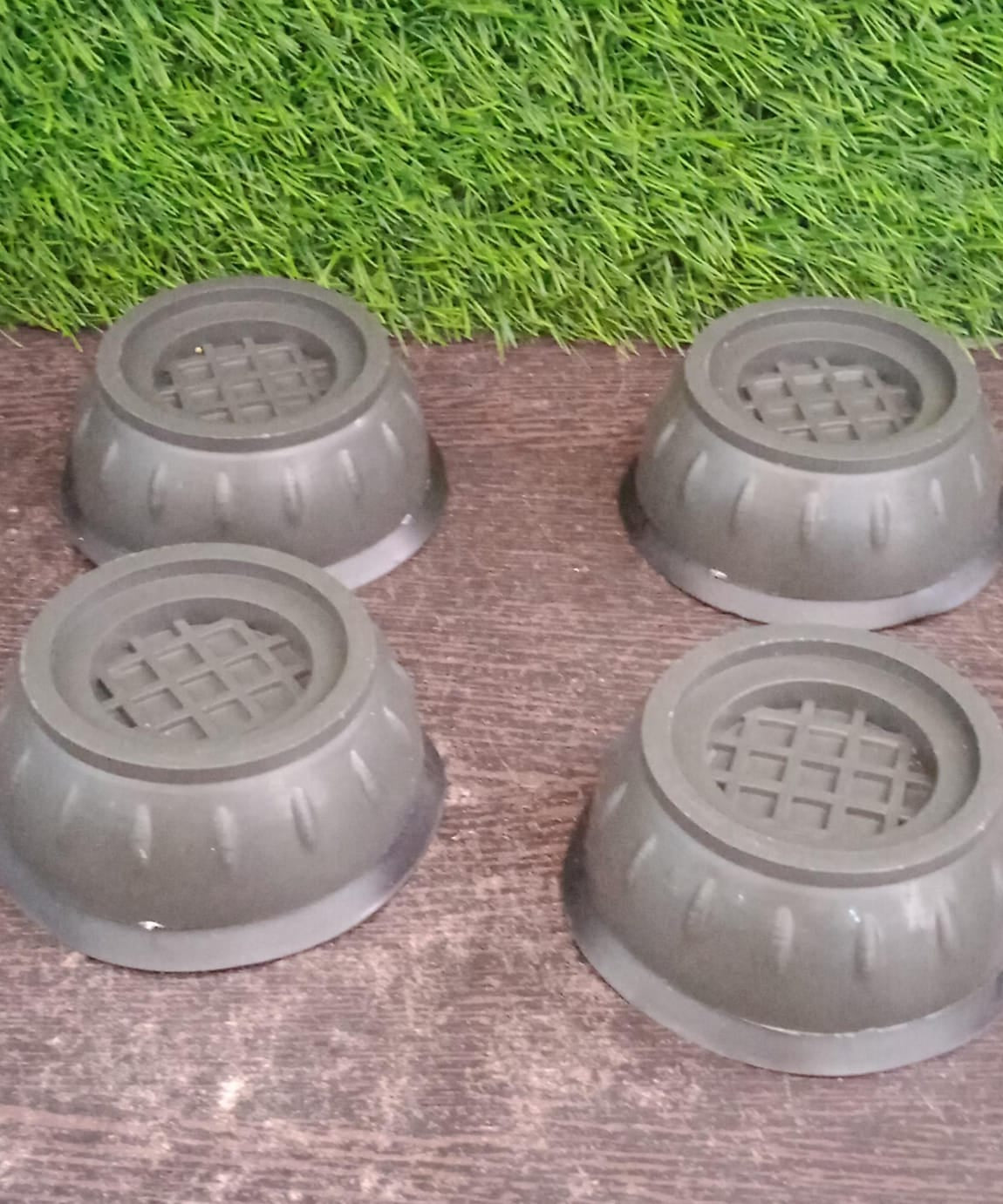 Vibration dampening pads with suction cups