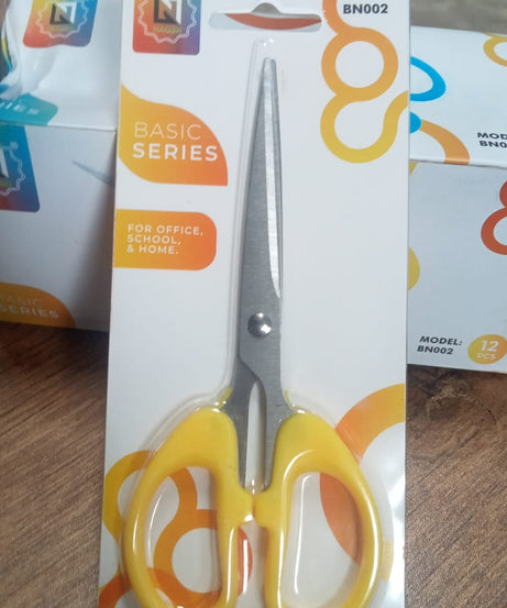 Stainless steel scissors with a focus on their sharp blades and ergonomic handle for precision cutting