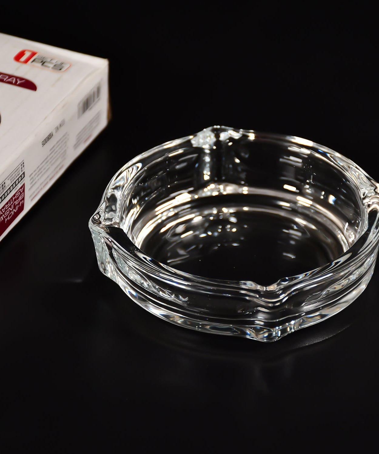 Crystal ashtray for cigars and cigarettes.