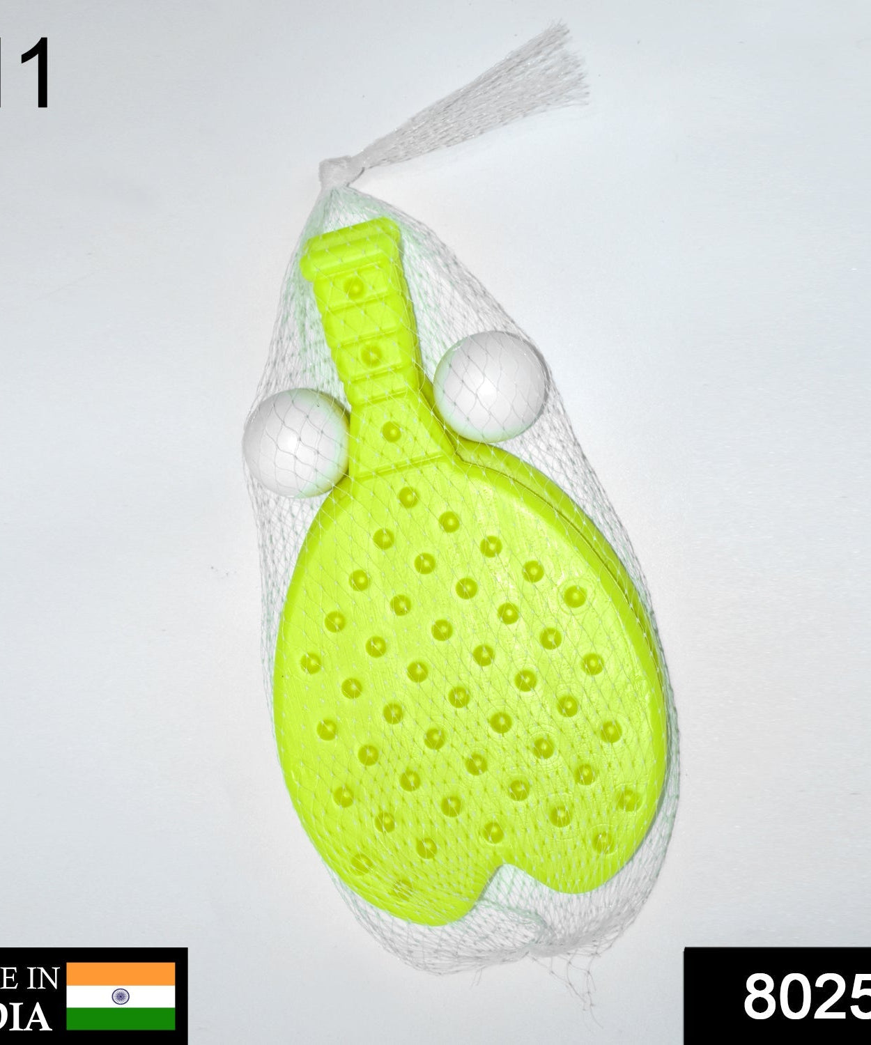 table tennis racquet and ball with colorful design