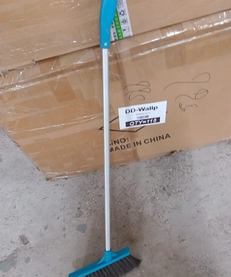 Long-handle scrub brush for cleaning floors and tiles, featuring stiff bristles.
