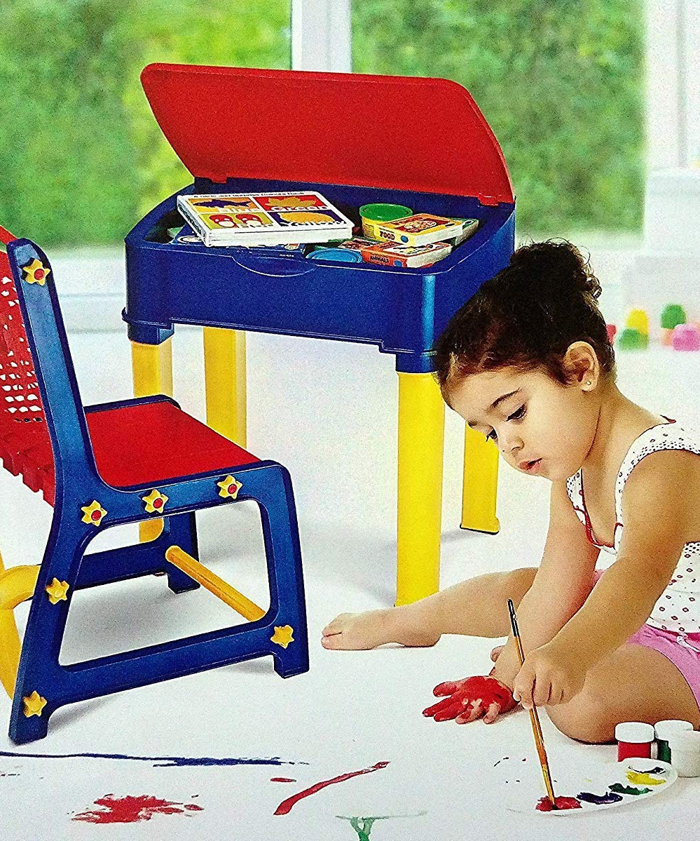 High-quality plastic study table and chair set in pink, includes a small box for pencils.