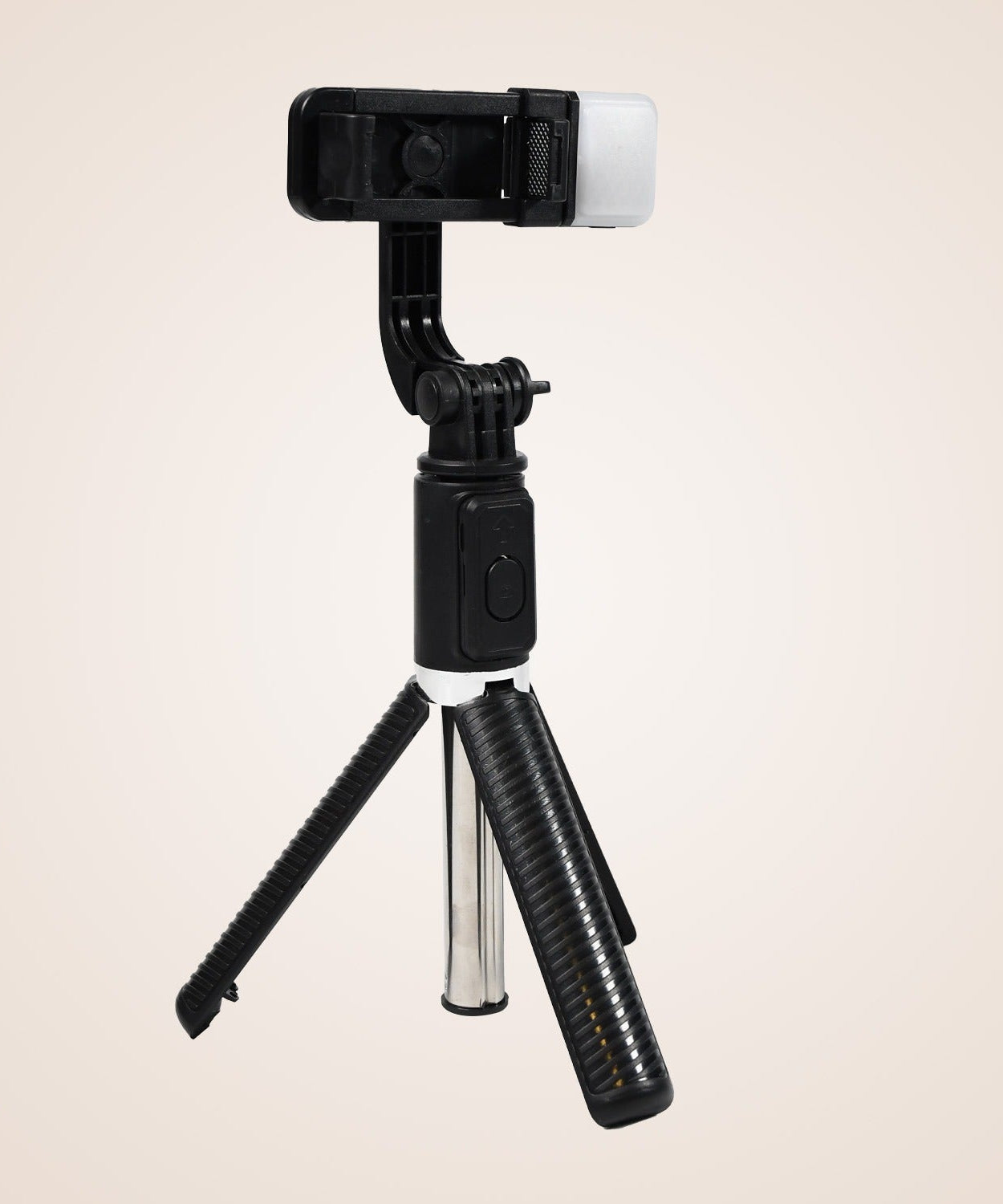 Compact selfie stick with tripod base and Bluetooth shutter