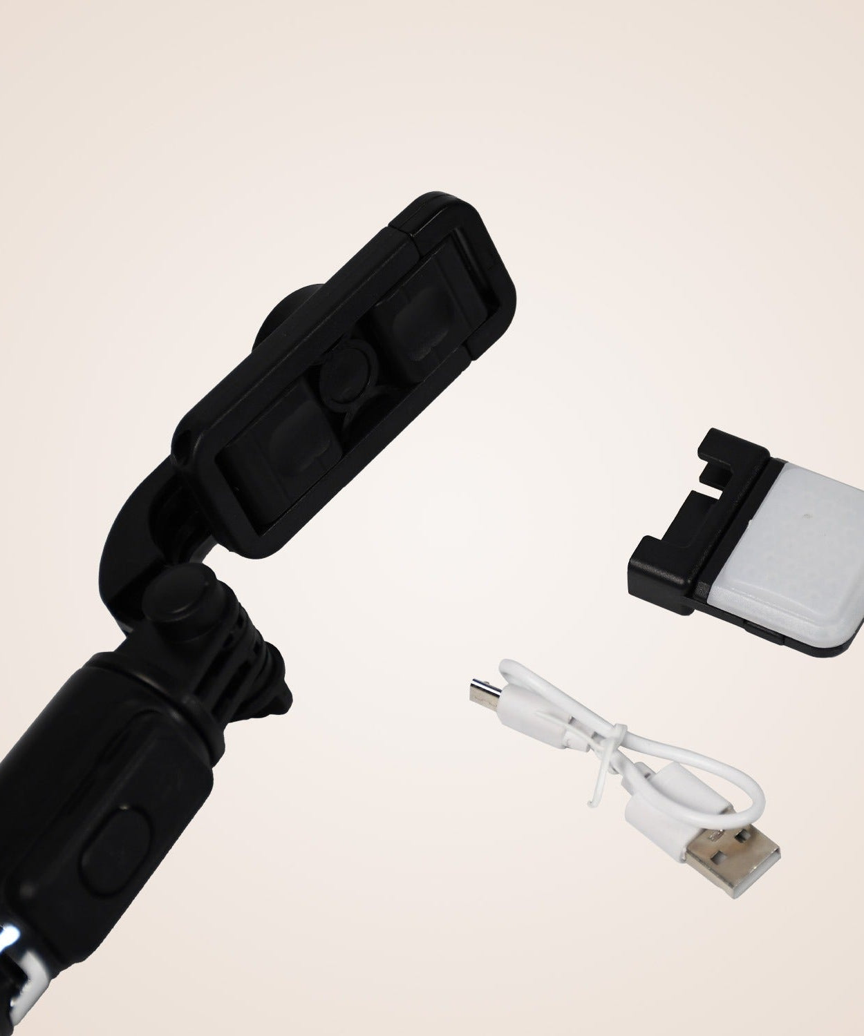Compact selfie stick with a built-in Bluetooth remote for selfies
