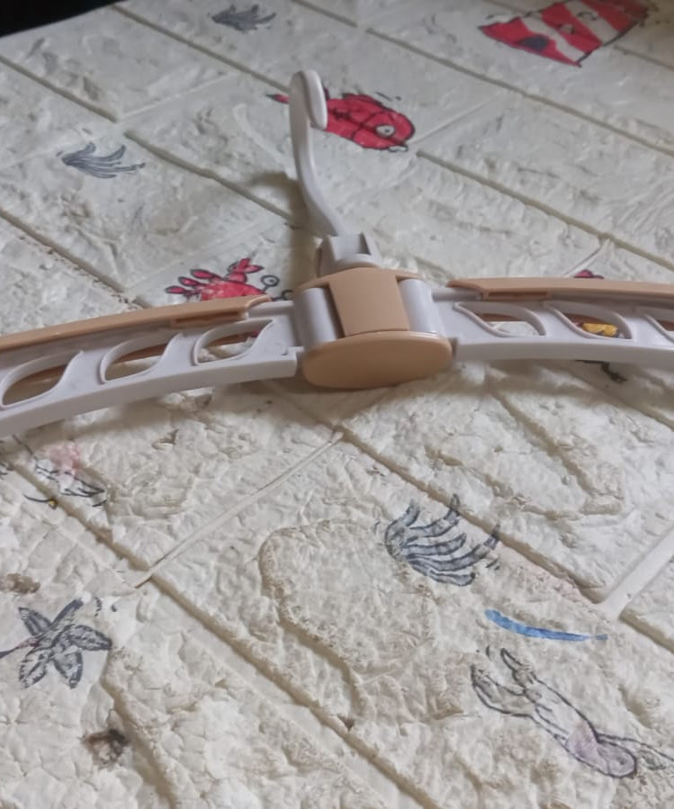 Compact travel clothes hanger with 360° rotation and adjustable features