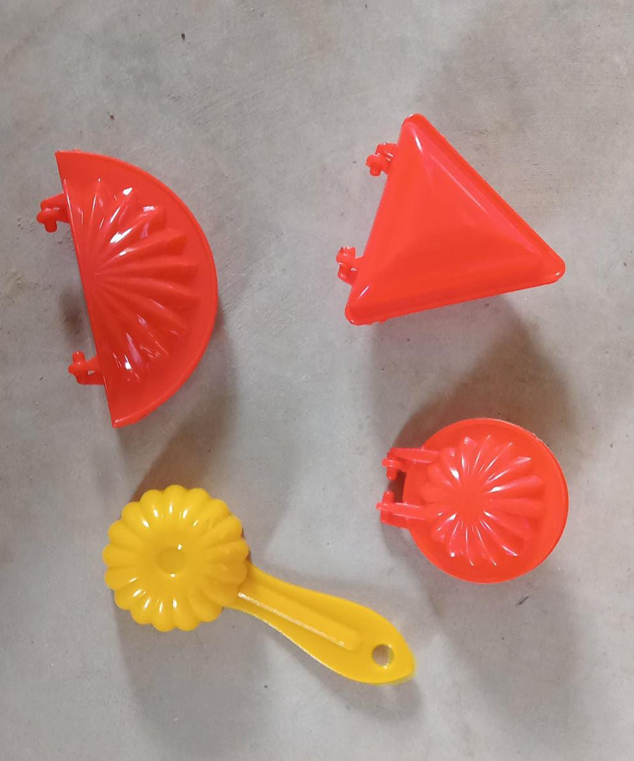 Four-piece set of red plastic kitchen dough press molds
