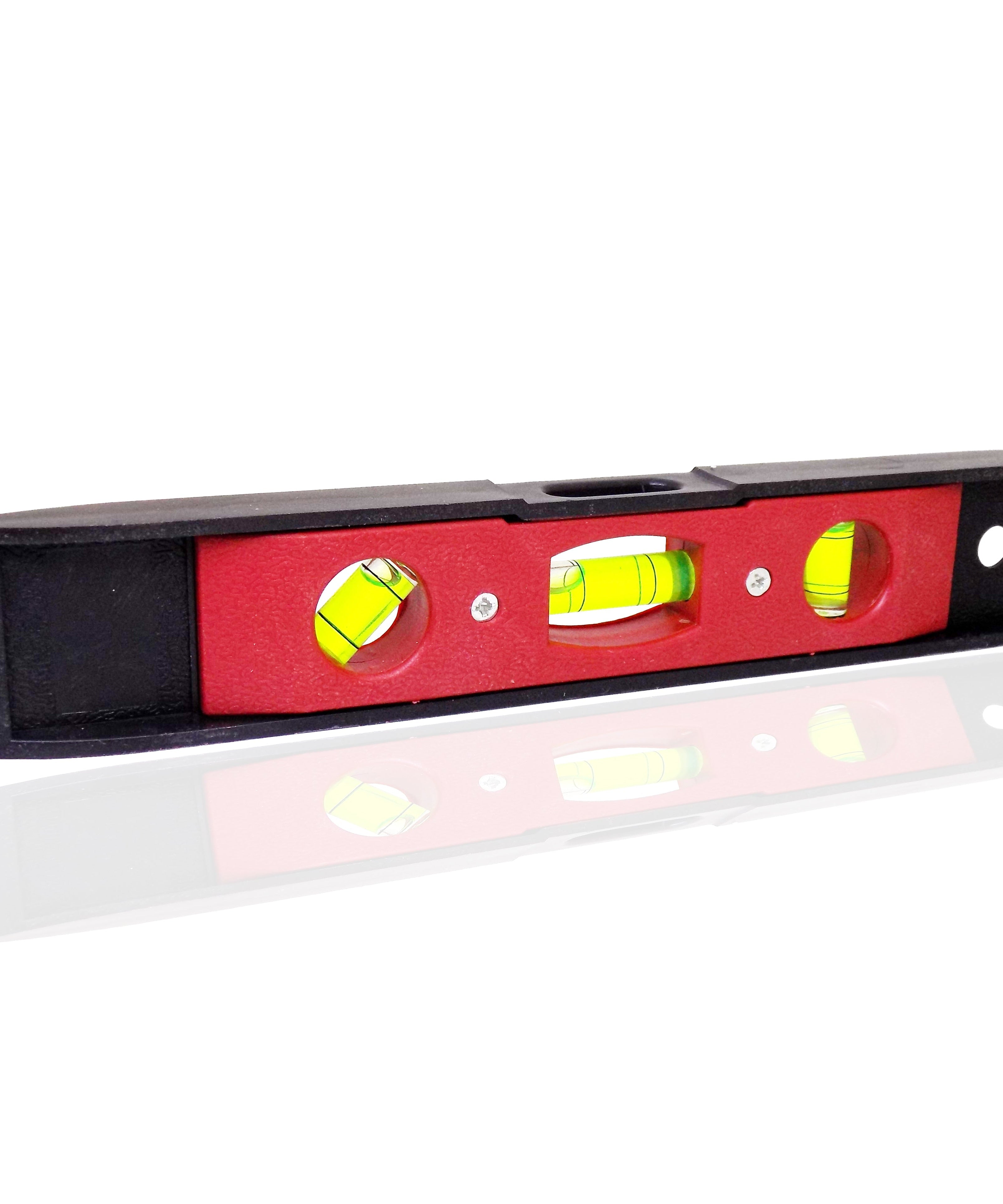 Miniature level ruler with three bubbles for leveling small projects.