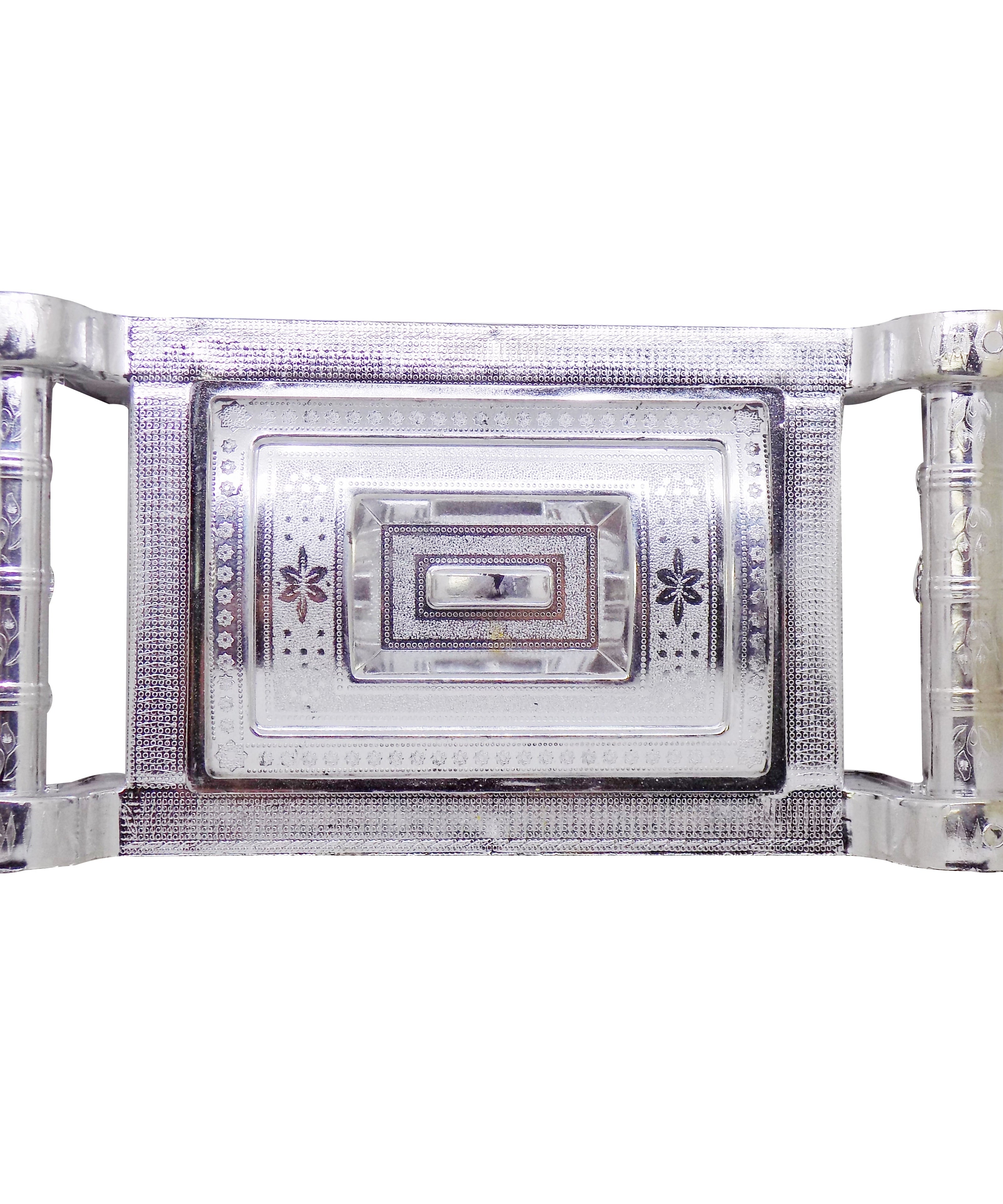 Silver gift box with four sections, featuring a royal design.