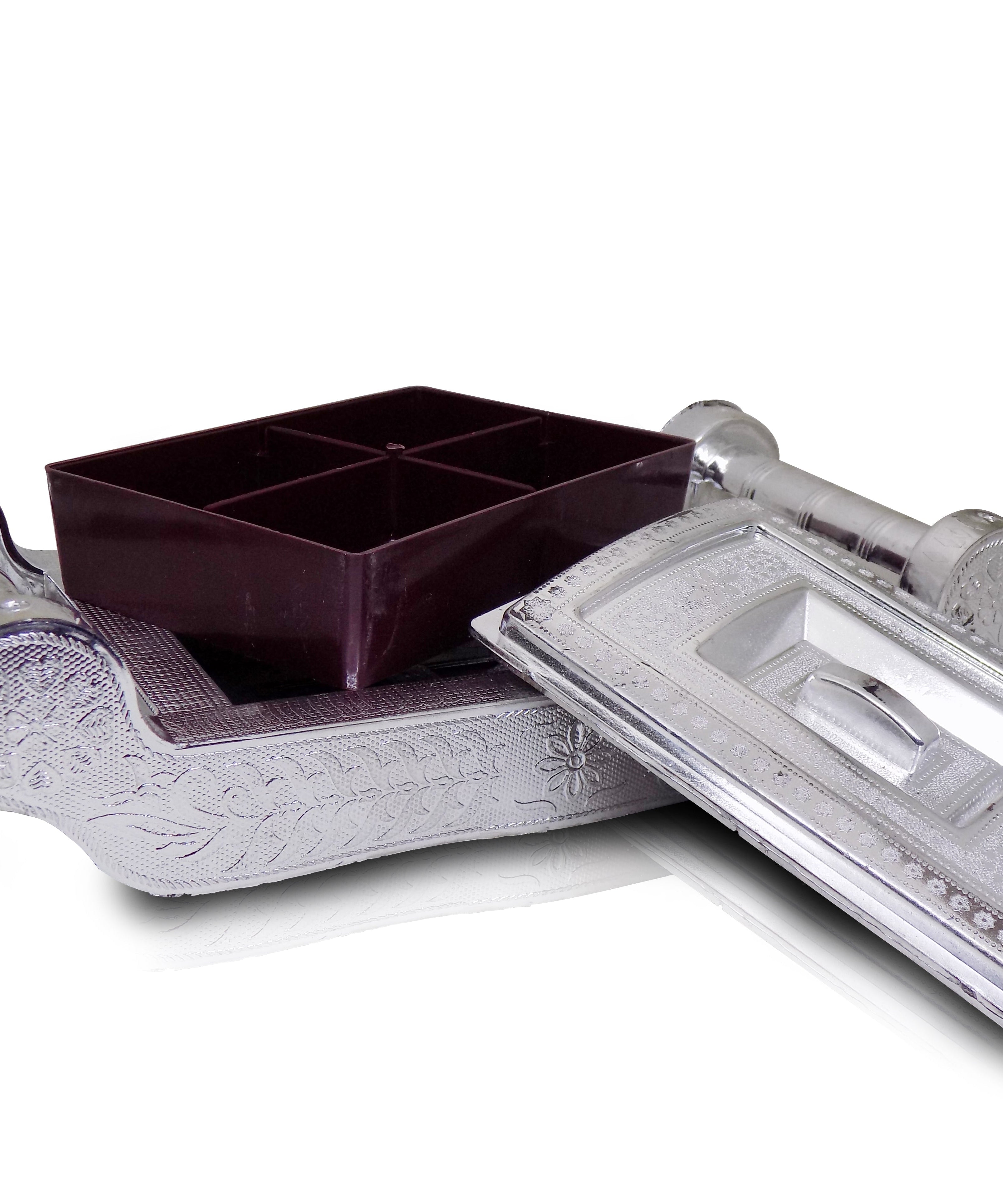 Decorative silver storage box with four sections for organizing.