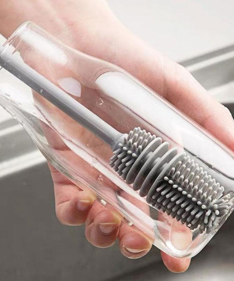 Multi-purpose cleaning brush for kitchen use.