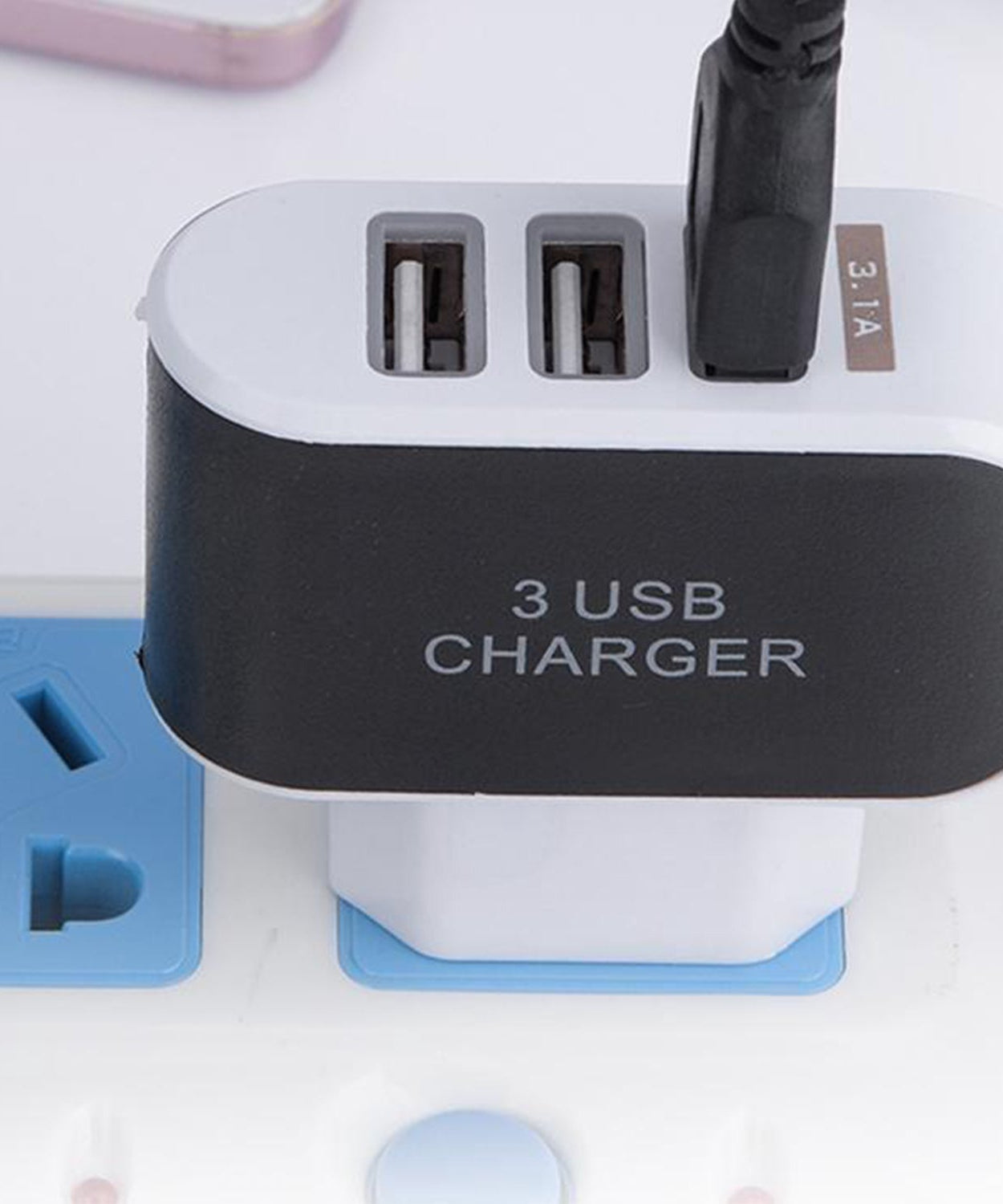 Side view of the triple USB wall adapter, demonstrating its compact and practical design