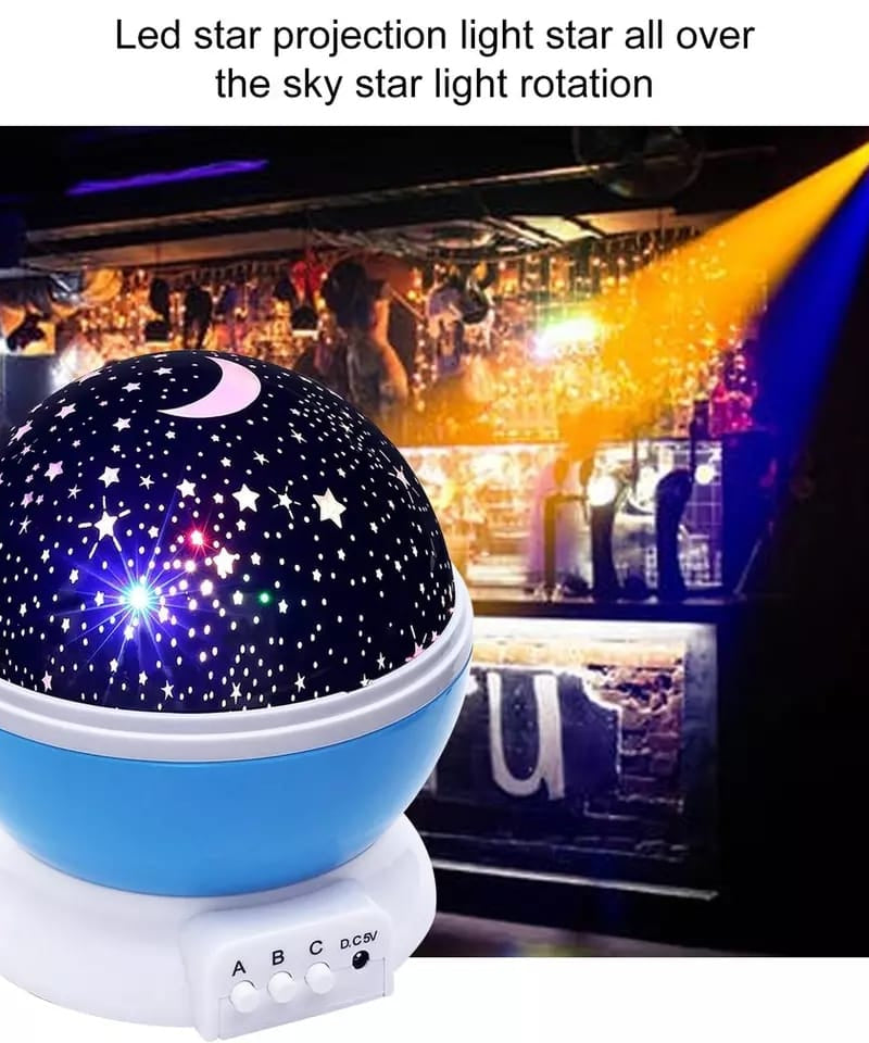 Rotating projection night lamp with star patterns