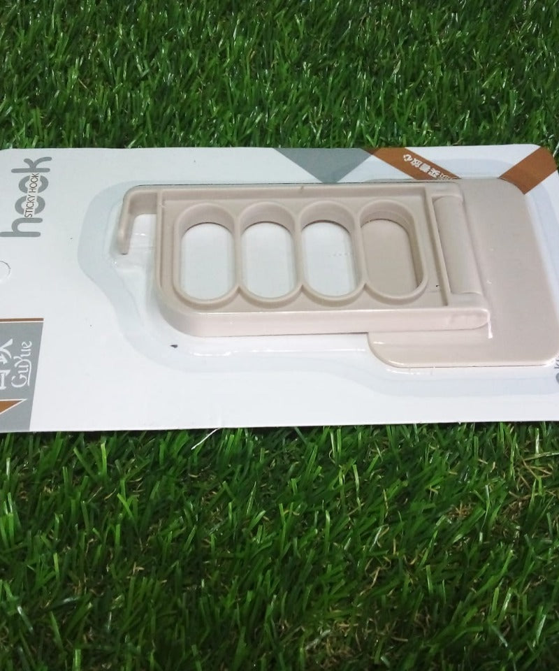 Durable door hook for use in bathroom, kitchen, bedroom, or office cubicle.