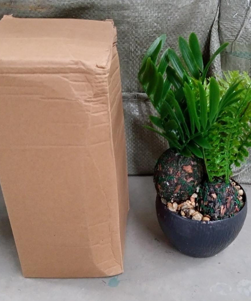 Potted artificial plant with a classic pot design