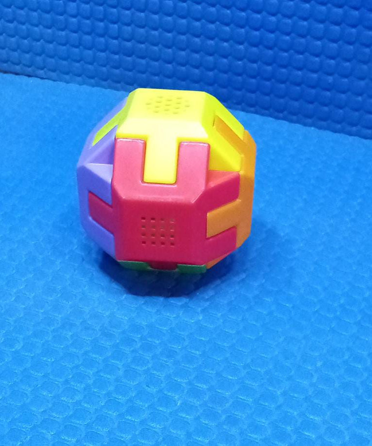 Activity cube with vibrant colors for children.