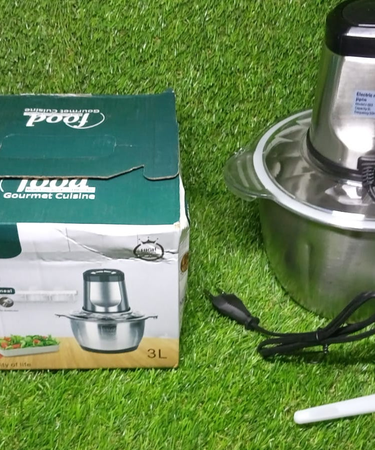 Meat grinder on counter