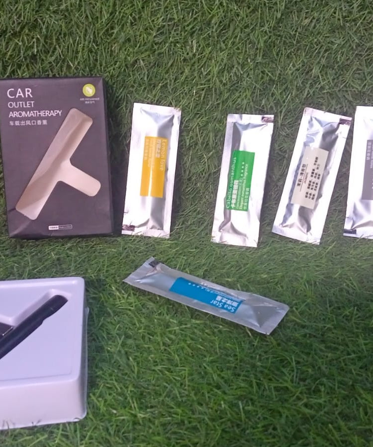 Car air freshener for AC vents, long-lasting with sweet scents.