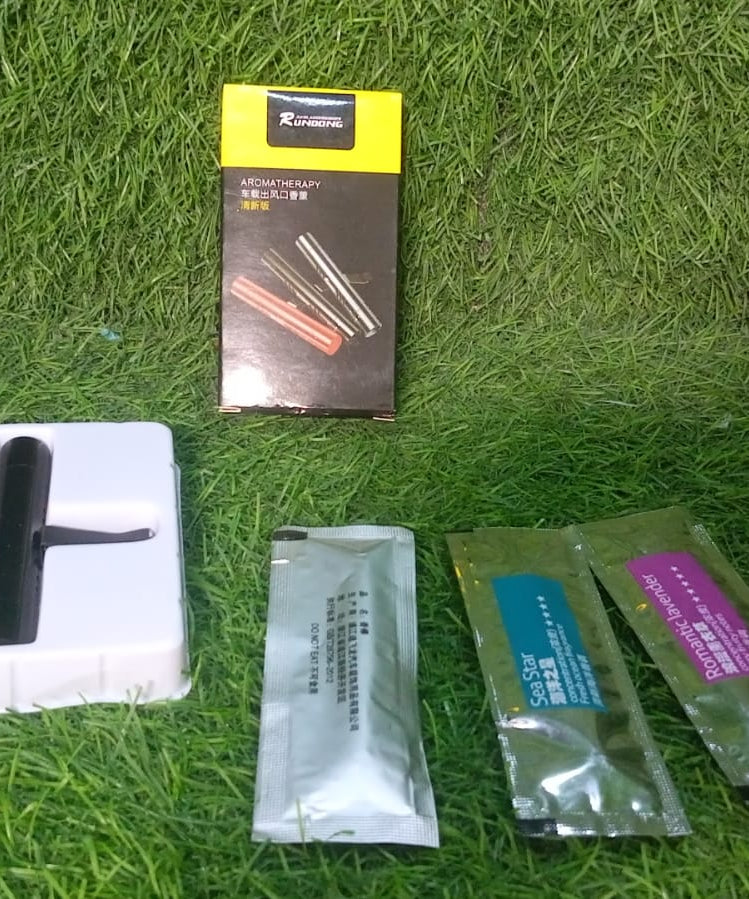 Car air perfume with magnetic attachment, rotating control, and various long-lasting scents.