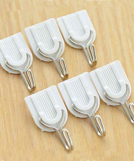 Self-adhesive hook for bathroom or kitchen.