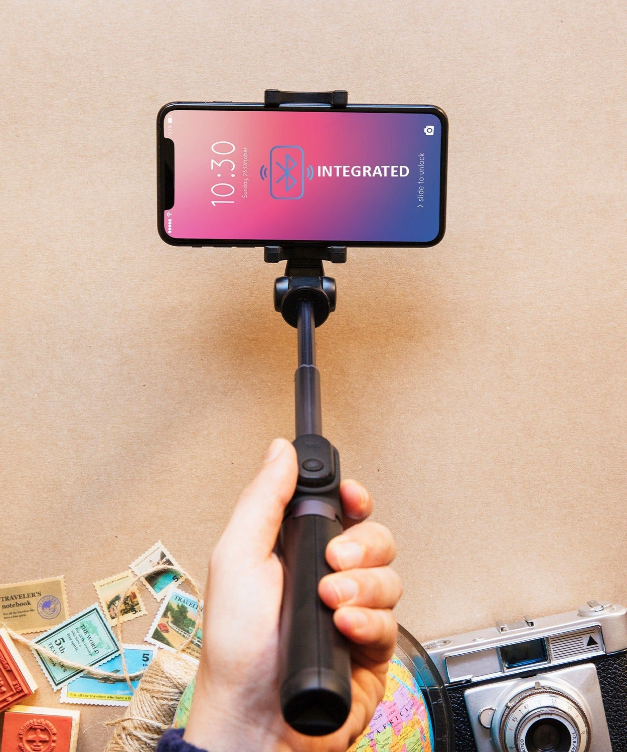 Folded selfie stick with phone holder and Bluetooth remote