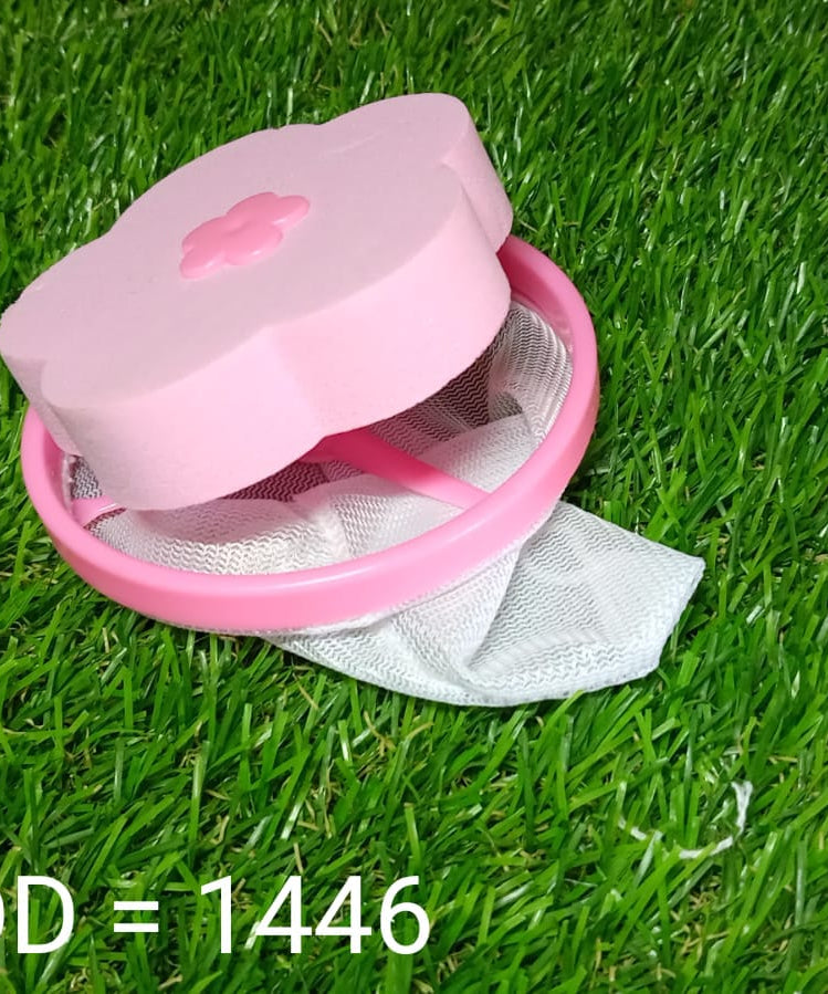 Mesh net bag for catching laundry lint and hair.