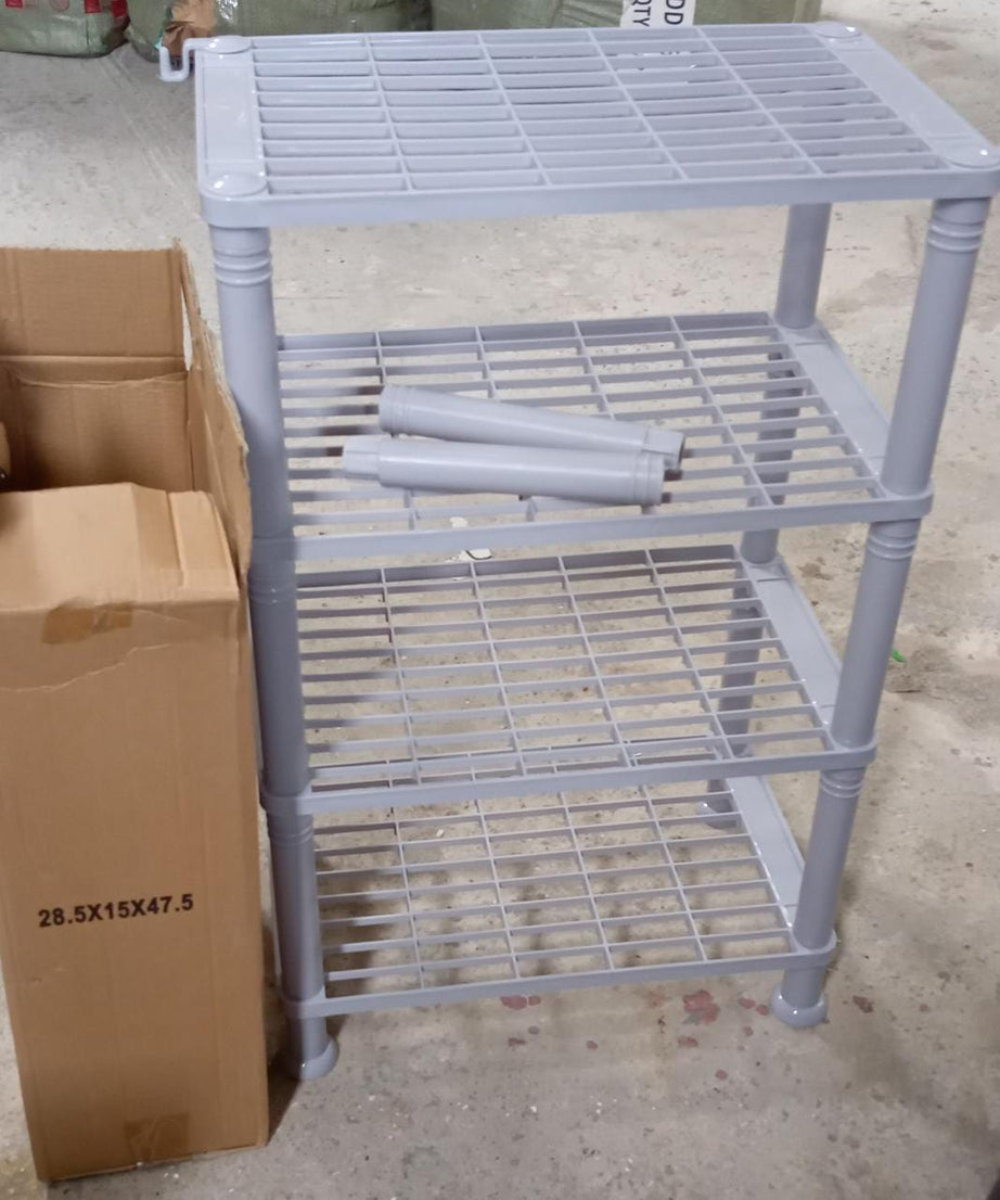 Narrow storage shelf with 4 layers, ideal for organizing small spaces in kitchen or bathroom.