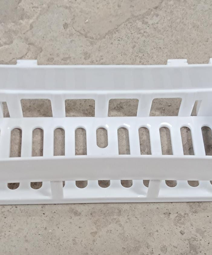 Plastic shower corner caddy with wall suction cup