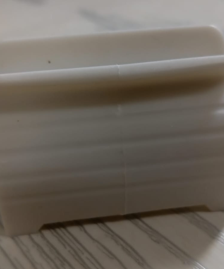 Tube toothpaste squeezer with seat holder for convenience