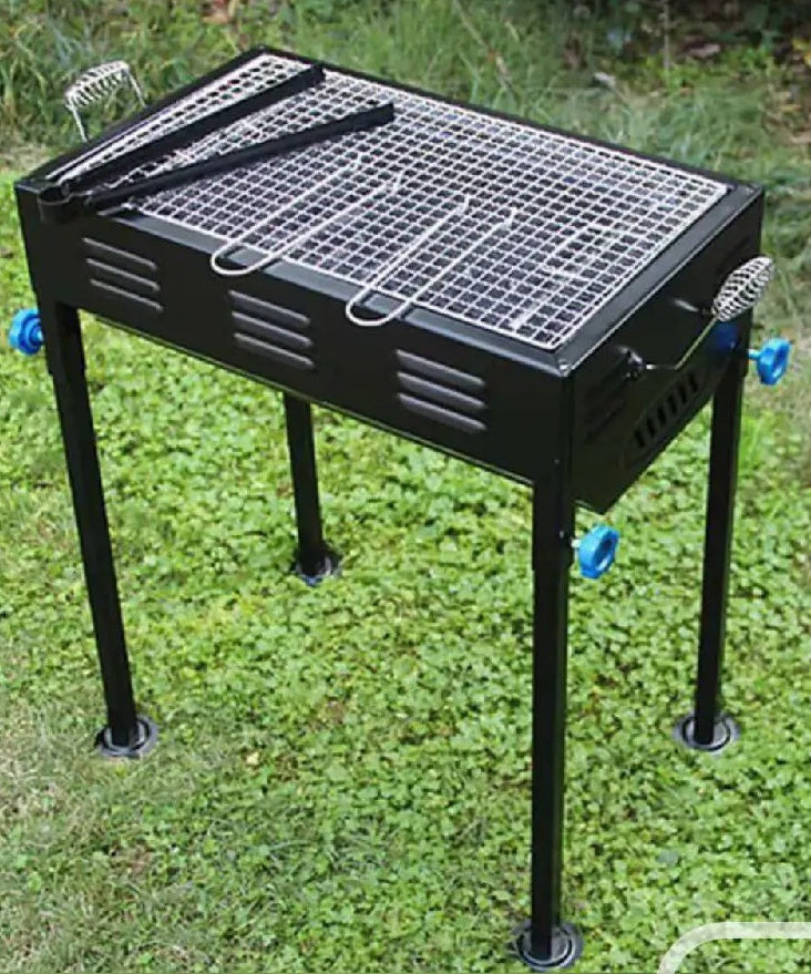 Barbecue grill with skewers and wooden handle