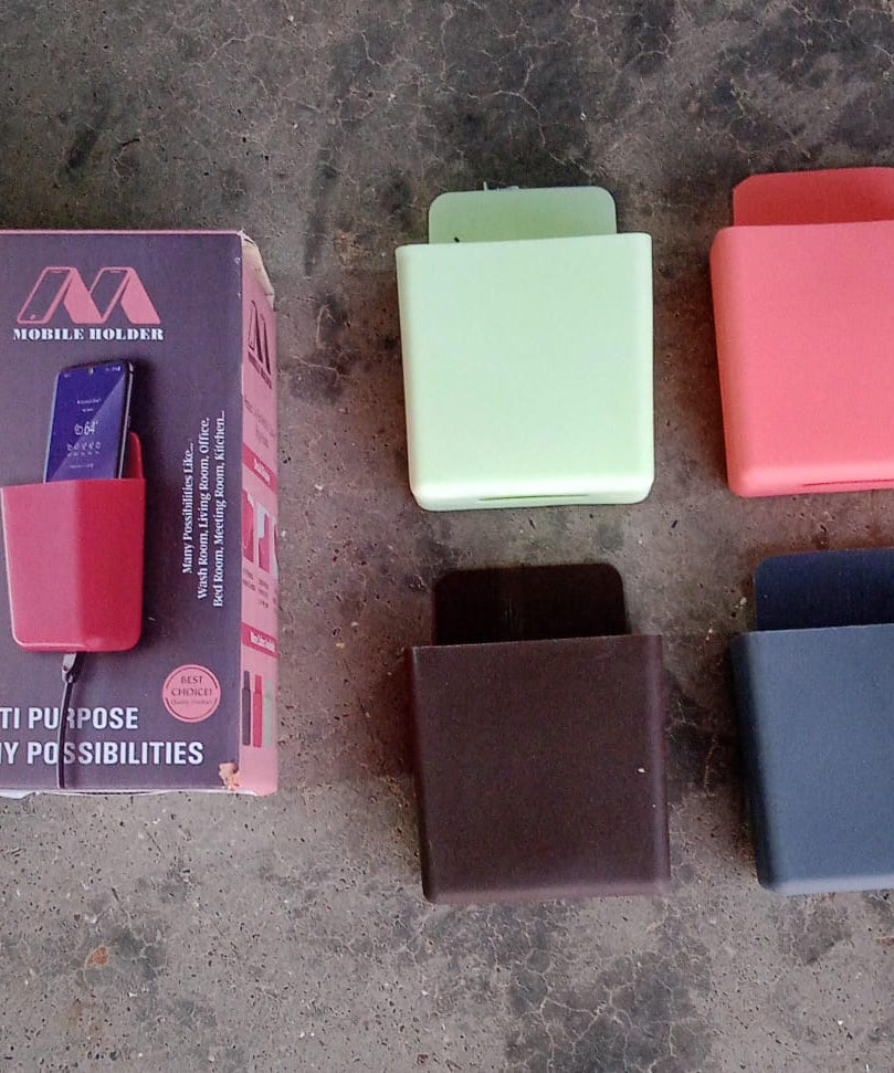 Multipurpose wall-mounted holder for remote and mobile devices