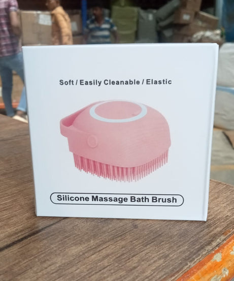 Massage bath body brush with silicone bristles and easy-to-use shampoo dispenser.