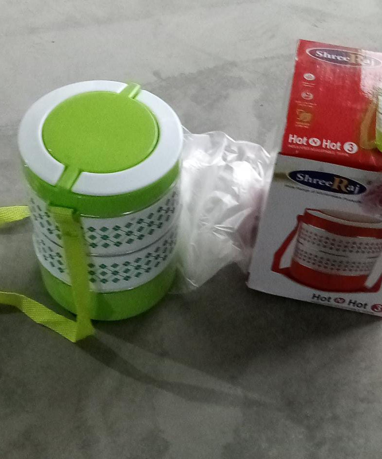 Blue insulated tiffin set with three layers.