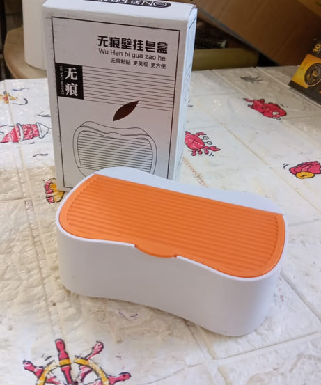 Portable soap holder with wall-mounting capability and waterproof design.