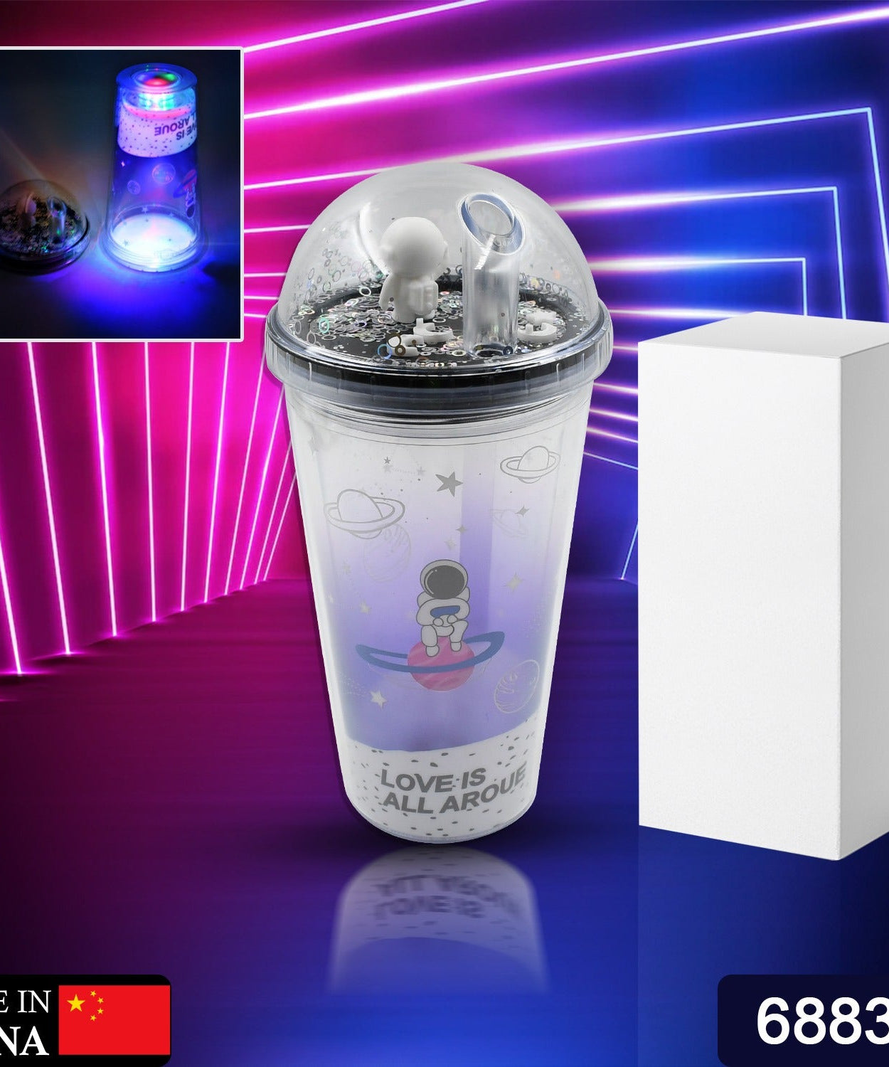 Insulated tumbler cup with space-themed design, LED glow