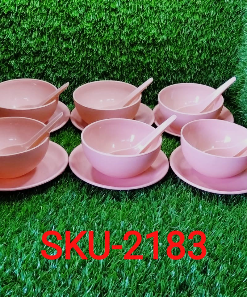 Full set of soup bowls with matching spoons and saucers.