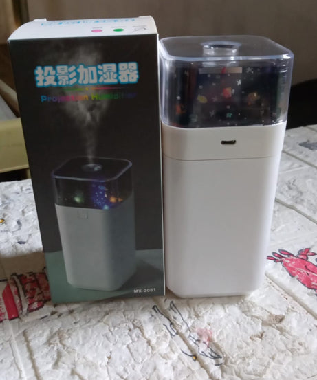 Night light projector with starry sky and humidifier function