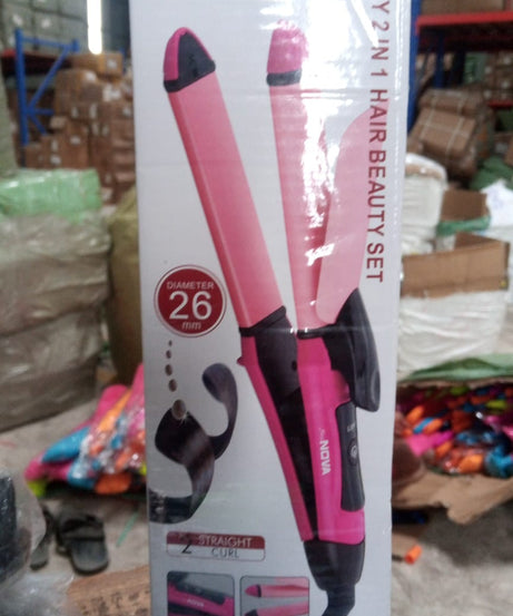 Multi-function hair straightener and curler.