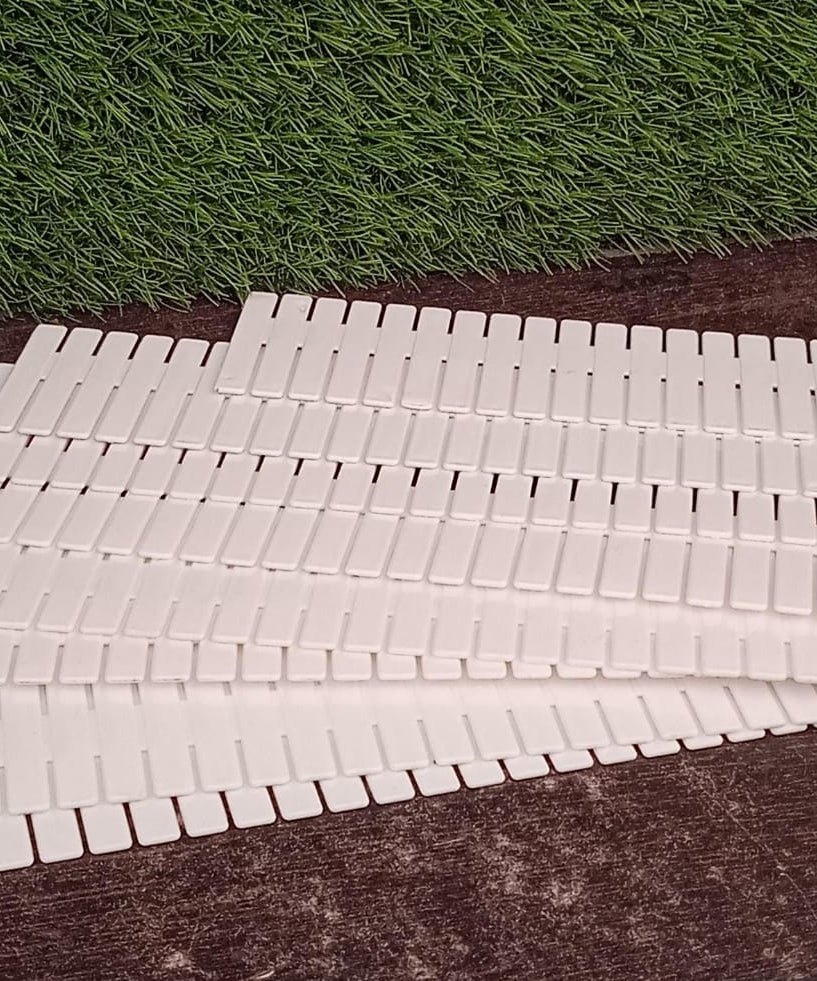 Plastic drawer dividers with adjustable grid, perfect for closet and kitchen drawer organization.