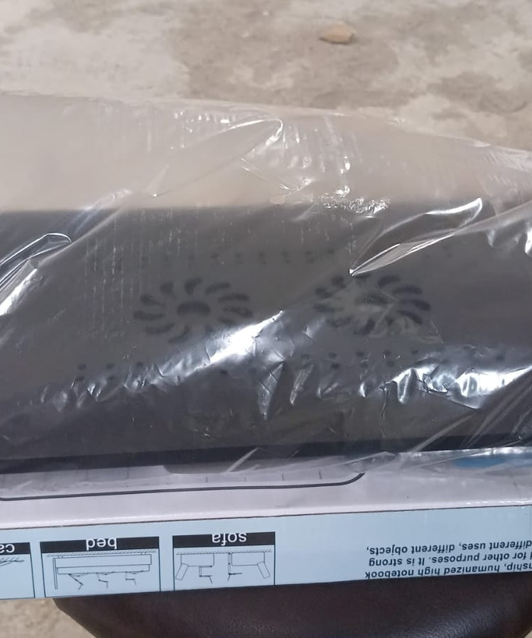 Modern style foldable laptop stand with two cooling fans, adjustable for ergonomic use.