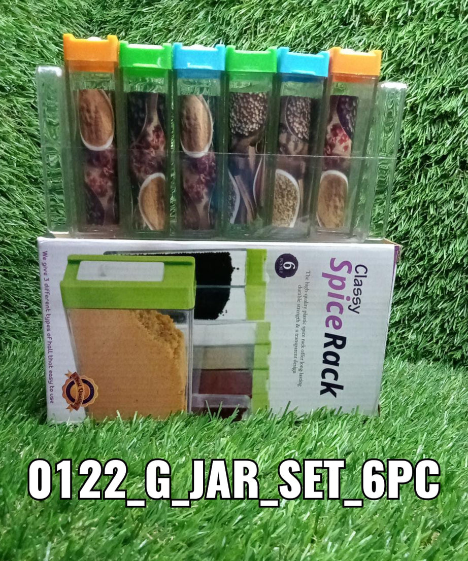 Assorted plastic spice jars with bright, colorful lids