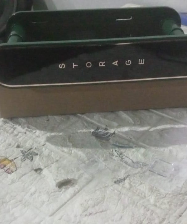 Compact wall-mounted clothes hanger rack.