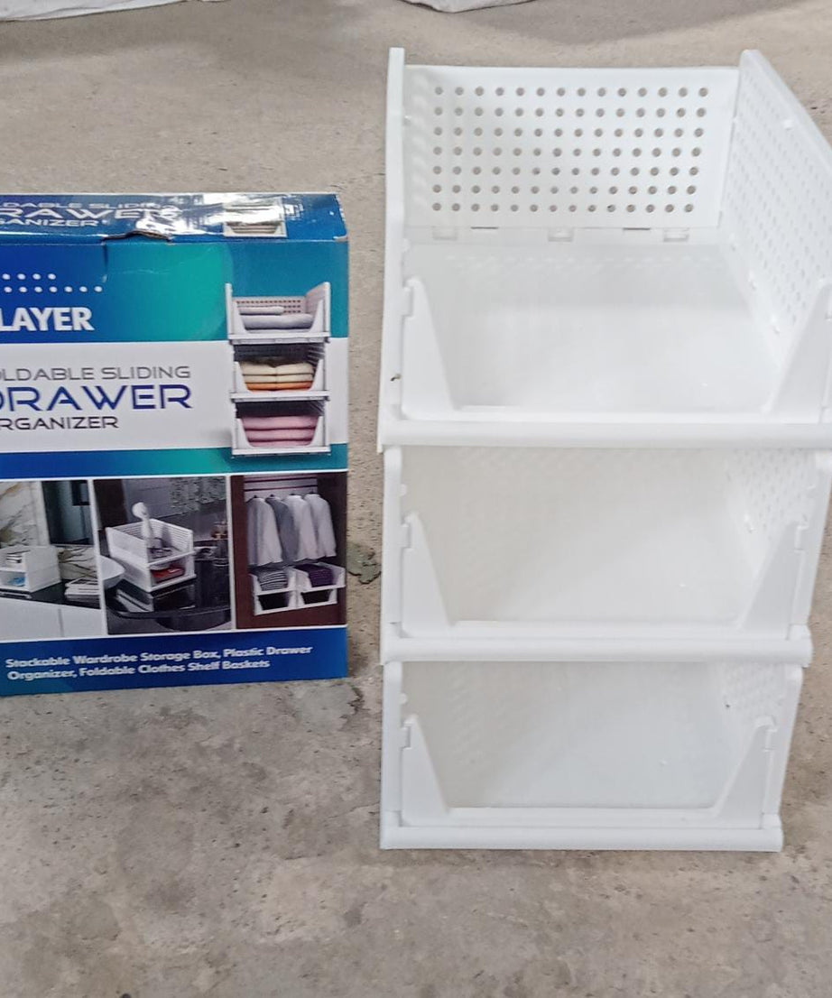 Stackable and foldable 3-layer clothes organizer, perfect for closet and drawer use.