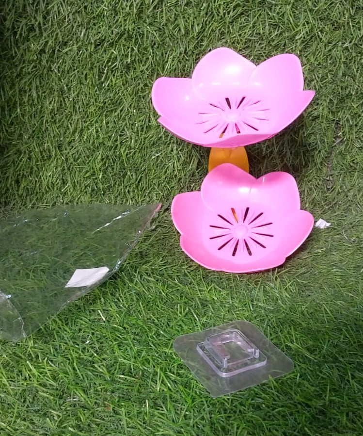 Self-draining soap dish with floral design, ideal for keeping soap dry in bathroom or kitchen.