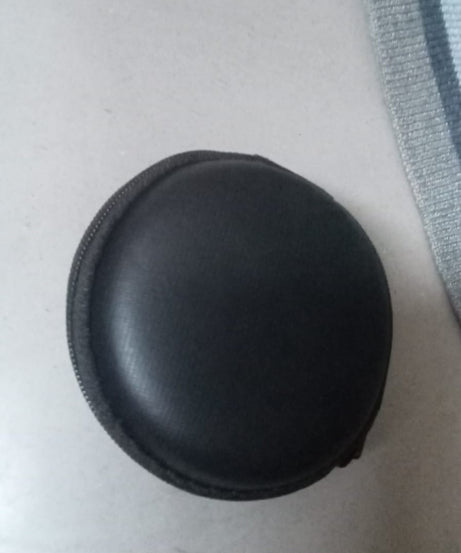 Round carrying case for earphones