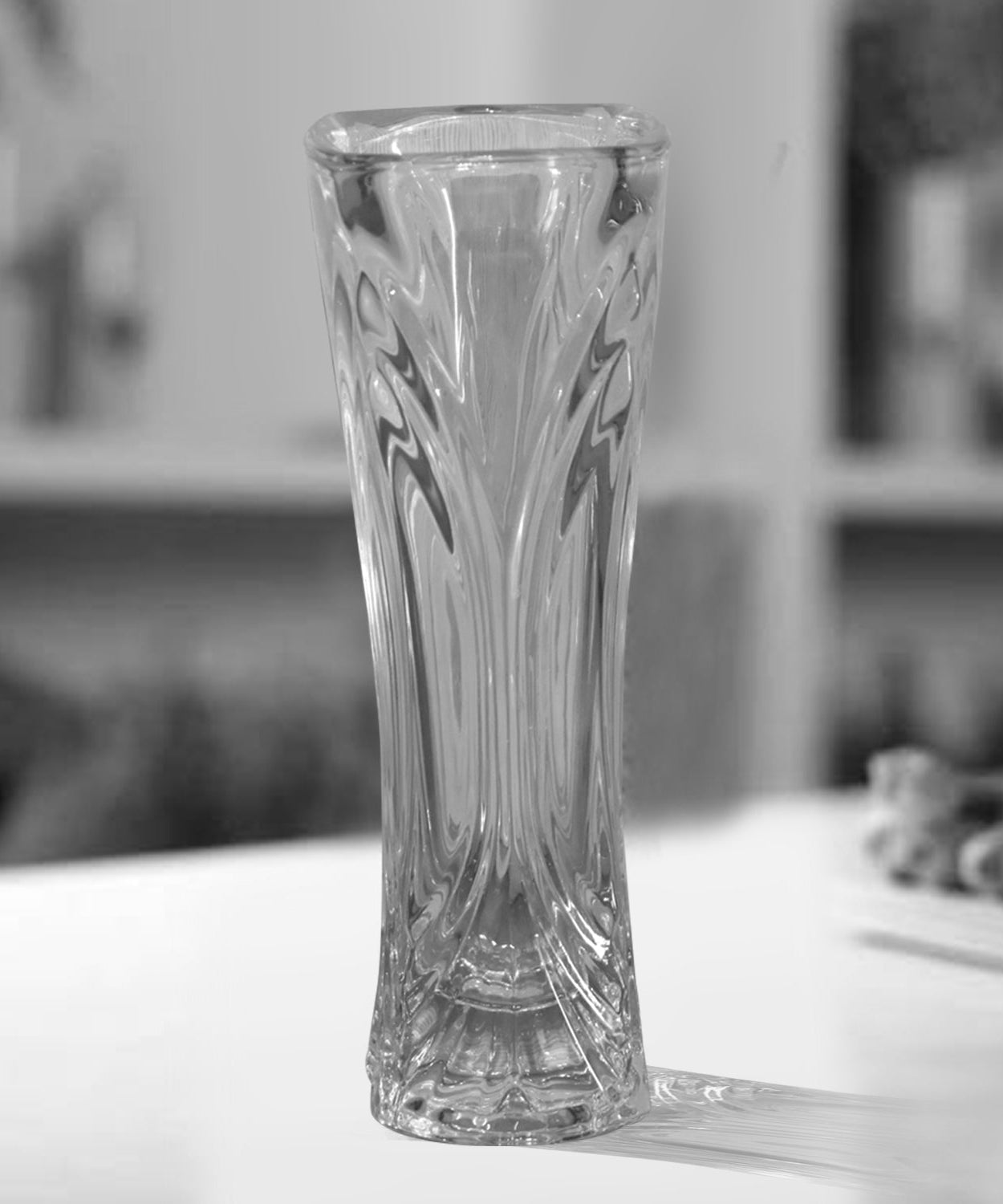 Modern crystal clear vase for elegant flower arrangements.